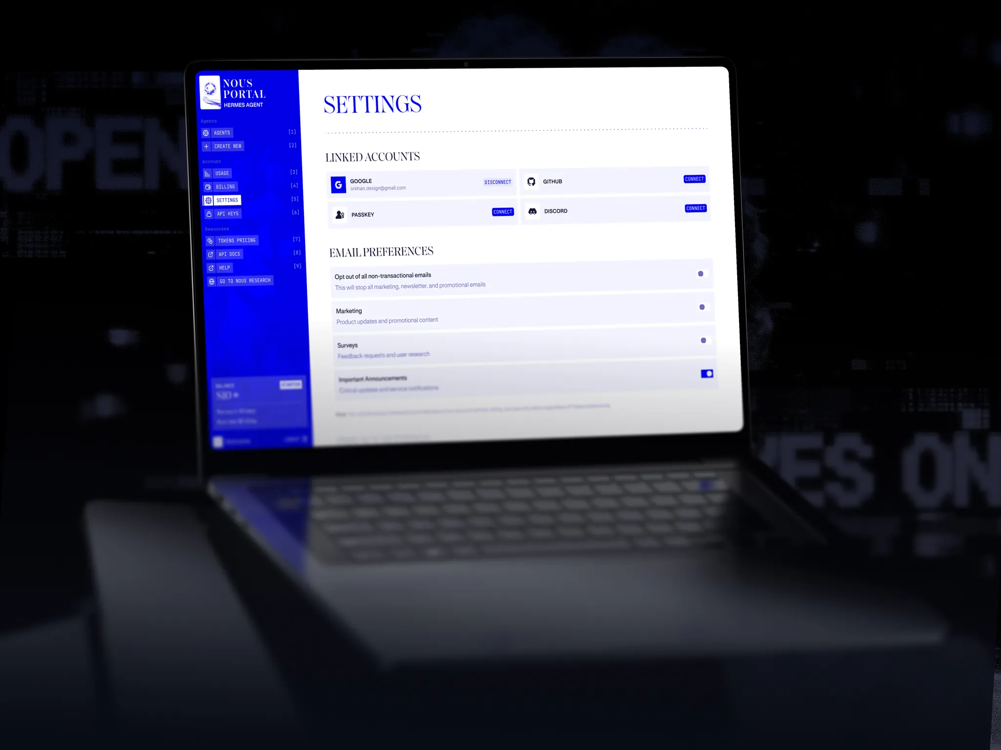 Nous Portal Settings on a laptop: linked accounts and email preferences